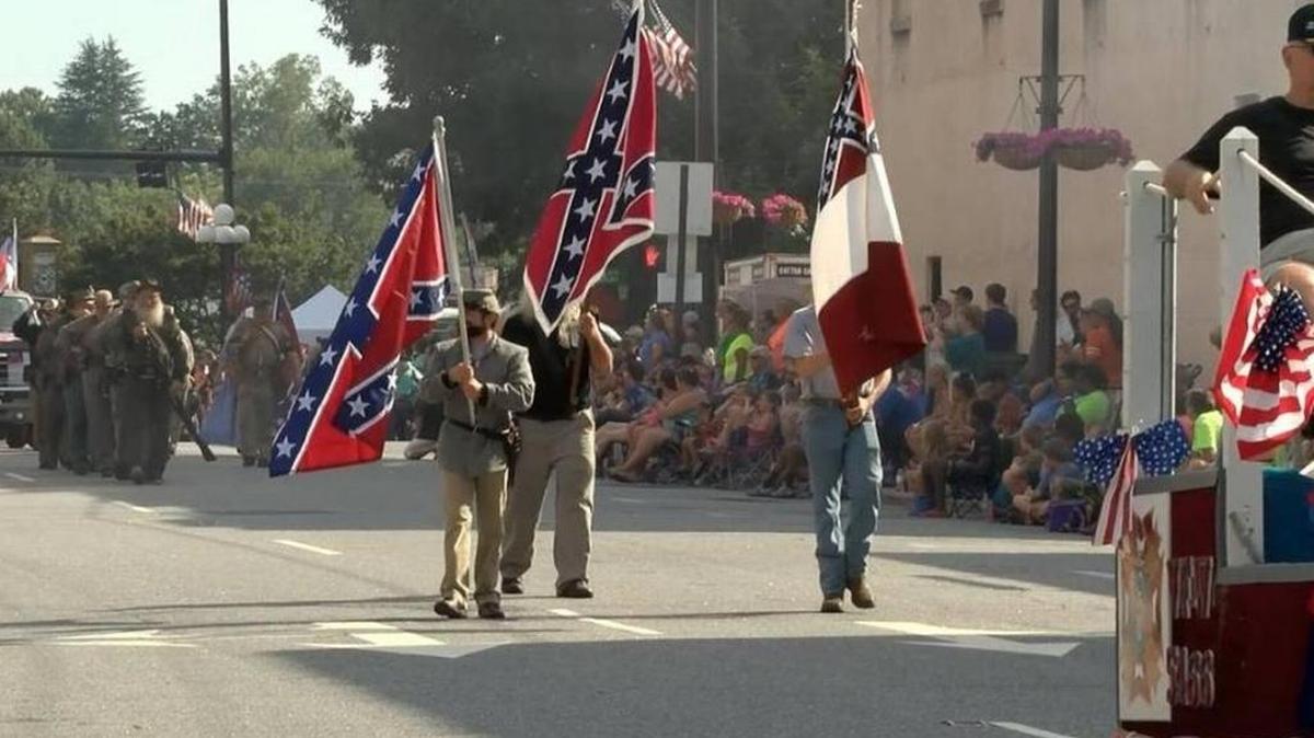The Sons of Confederate Veterans marched in the 2017 Soldiers Reunion parade in Newton in August. Prosecutors dismissed charges against a retired Catawba County principal accused of pepper spraying Confederate veteran reenactors during the parade.