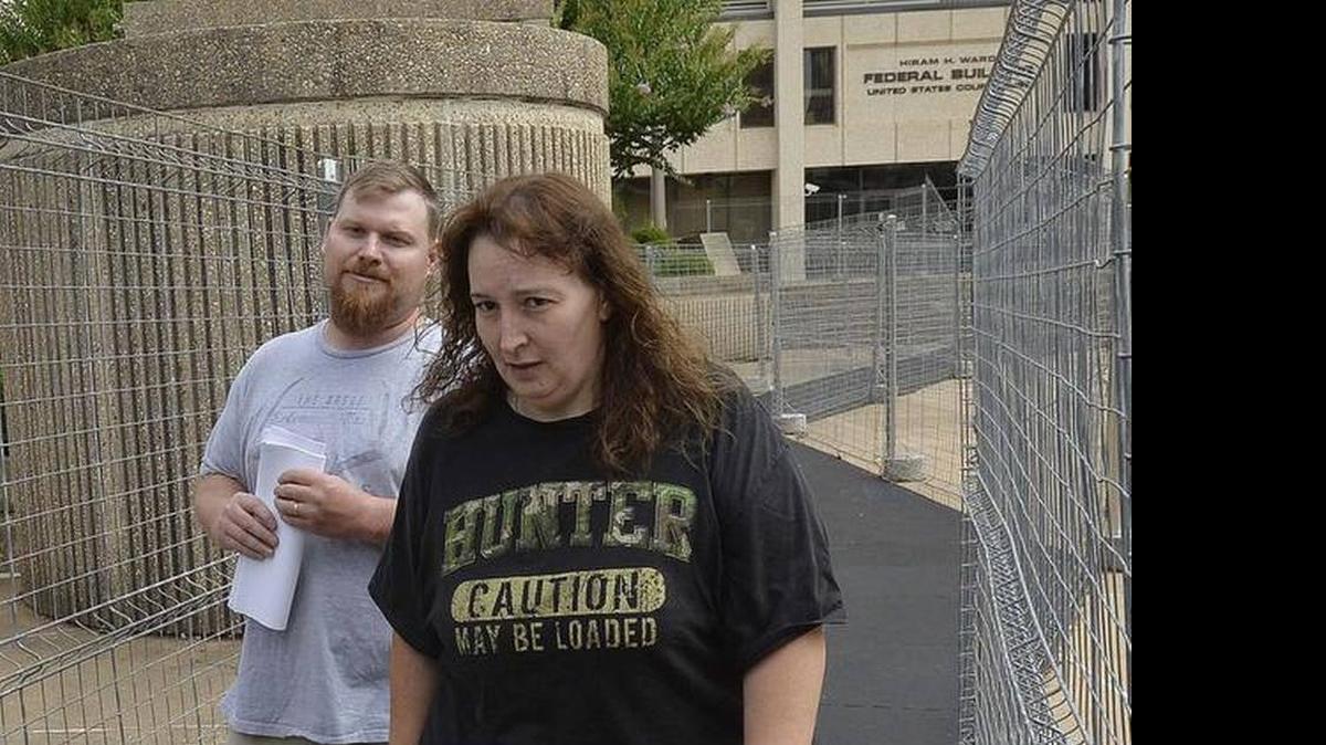 
Sandy Parsons, left, and Casey Parsons leave the federal courthouse in Winston-Salem in July 2014 after they were charged with tax evasion and other crimes.
