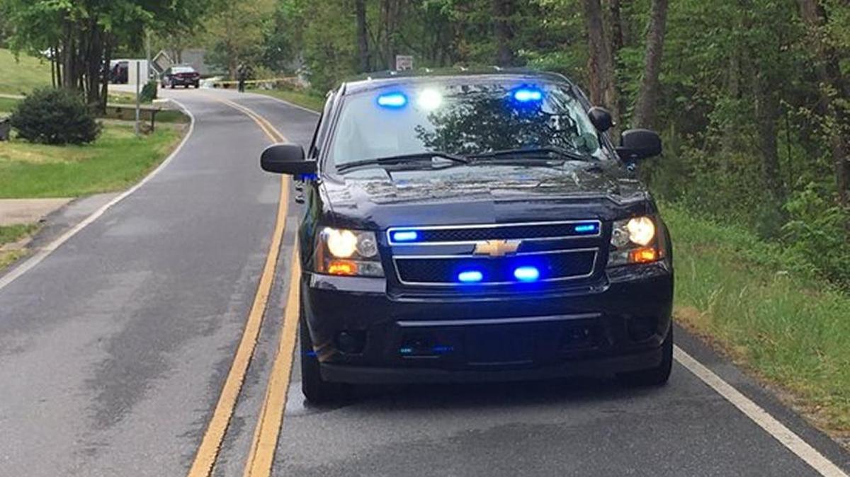 Starcross Road in Lenoir was closed Friday morning after police said they shot a man who fired at them from his home.