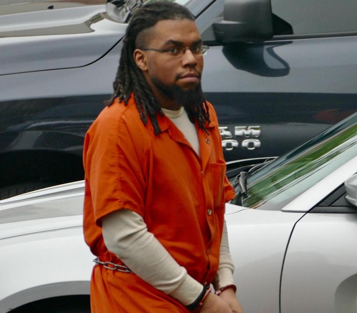 Malcolm Hartley, the the triggerman in the Doug and Debbie London murders walks into the Federal Court in Charlotte for sentencing Tuesday morning.