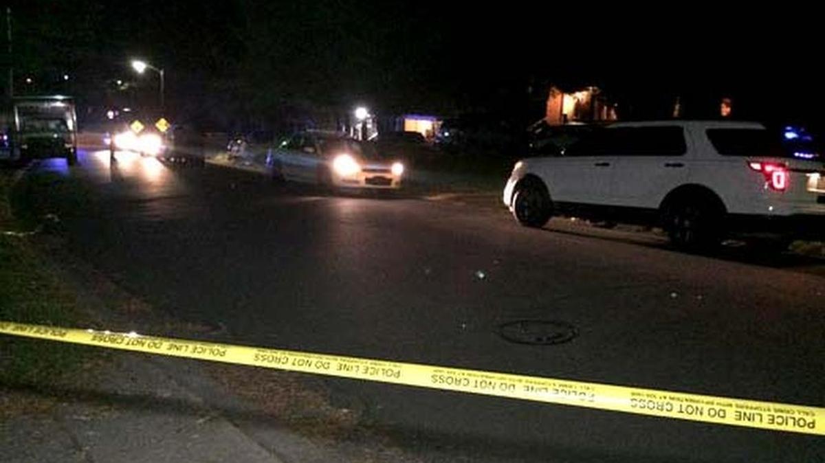 Charlotte-Mecklenburg police quickly drew their guns when the family member of a shooting victim drove through crime scene tape in west Charlotte early Wednesday.