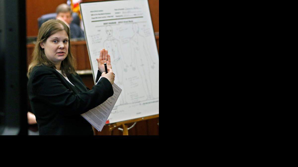
Dr. Lauren Scott, a forensic pathologist for the Chief Medical Examiner’s office in Raleigh, testifies Monday as to the cutting wounds found upon the hand and arm of Jamie Hahn during Scott’s autopsy of Hahn in April 2013. Scott was the first witness on the fourth day of testimony in Jonathan Broyhill’s trial. Broyhill is accused of killing is charged in the murder of Jamie K. Hahn and attempting to kill her husband, Nation Hahn, in April 2013. Scott’s opinion is that Jamie Hahn died of multiple stab wounds from the attack.
