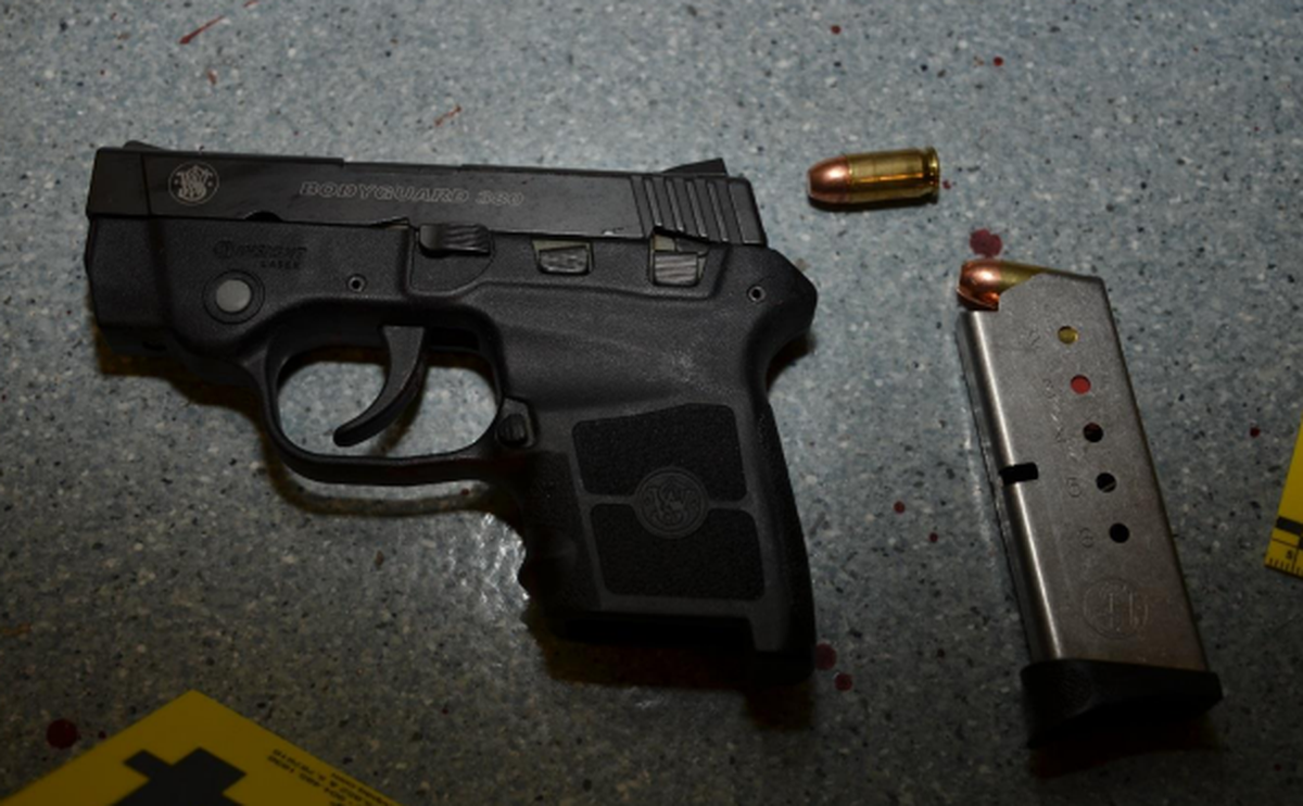 Investigators say police recovered a .380-caliber handgun near the body of James Cook in a Huntersville hospital. The district attorney’s office said Cook, 76, pulled the handgun from a suitcase in his room, fired it twice and later pointed it at police before they shot and killed him.
