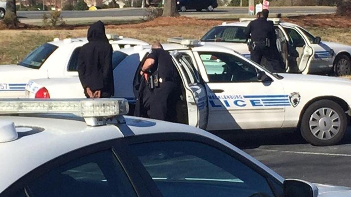 Mecklenburg County sheriff’s deputies stopped a vehicle with a shooting victim and several passengers inside on Mallard Creek Road on Saturday afternoon. Charlotte-Mecklenburg police are shown investigating the scene.