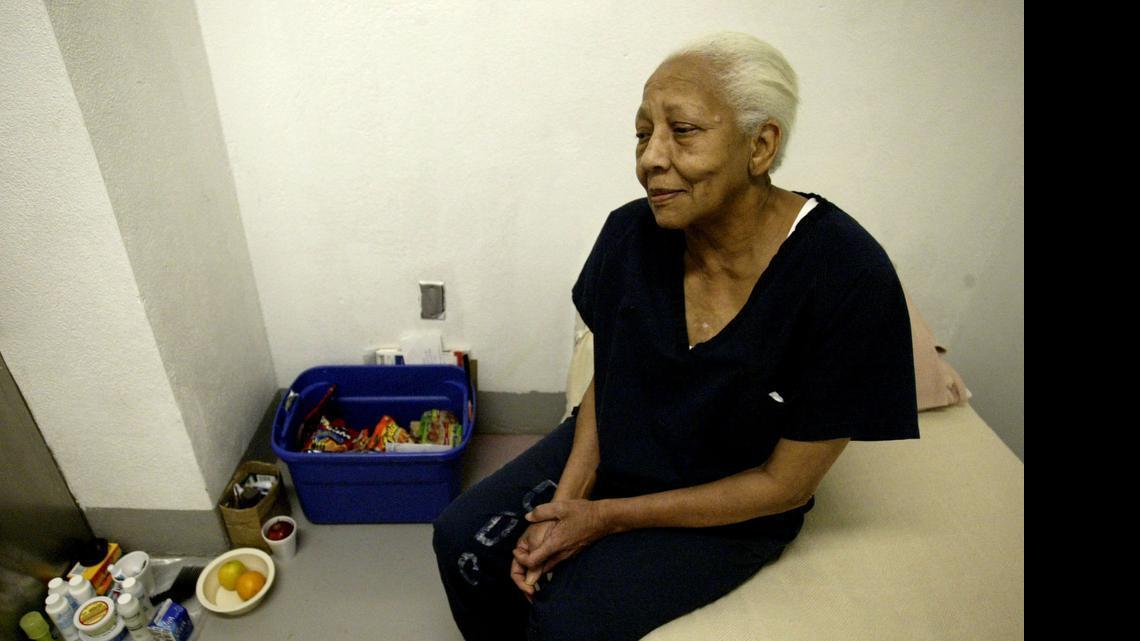 
Doris Payne, an international jewel thief, sits in her cell at Clark County jail in Las Vegas, Sept. 23, 2005. Payne, who was successful stealing jewels for more than 60 years, faced charges that she stole a ring from a Neiman Marcus store. (AP Photo/Jae C. Hong)
