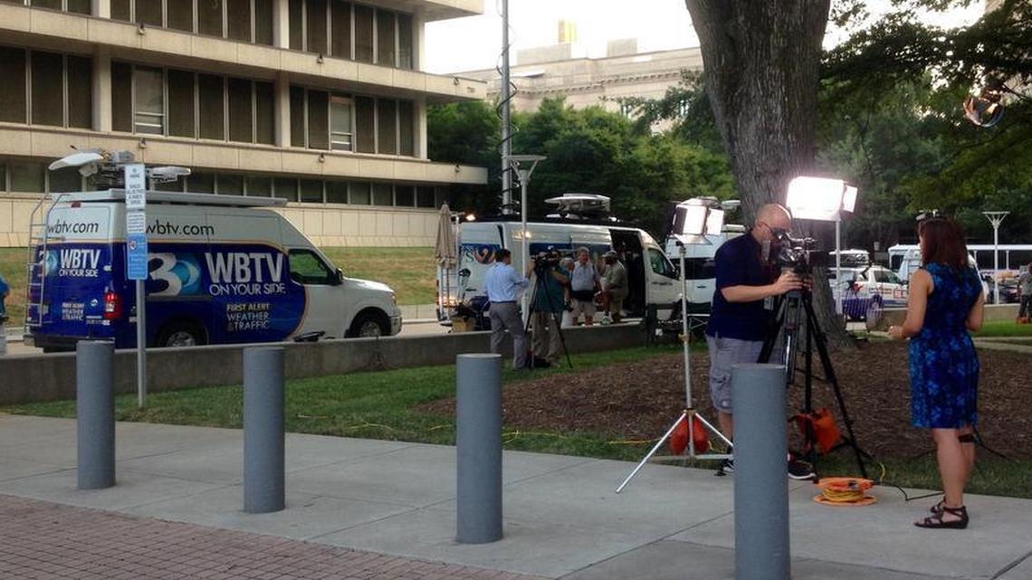 
Local media gather outside the Mecklenburg County Courthouse in preparation for the Wes Kerrick trial on Monday, July 20, 2015.
