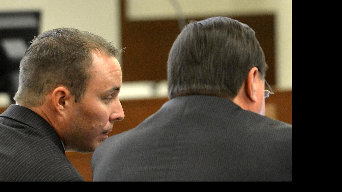 
Former CMPD officer Wes Kerrick with attorney George Laughrun during the first day of Kerrick's trial for killing Jonathan Ferrell, Monday July 20, 2015. 
