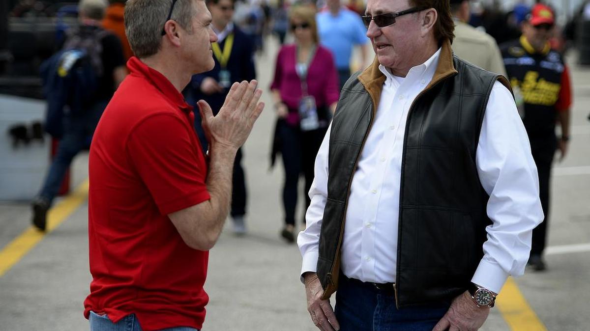 NASCAR Sprint Cup Series driver Bobby Labonte and team owner Richard Childress talk in the garage area at Daytona International Speedway in Daytona Beach, Fla., on Feb. 21, 2015.