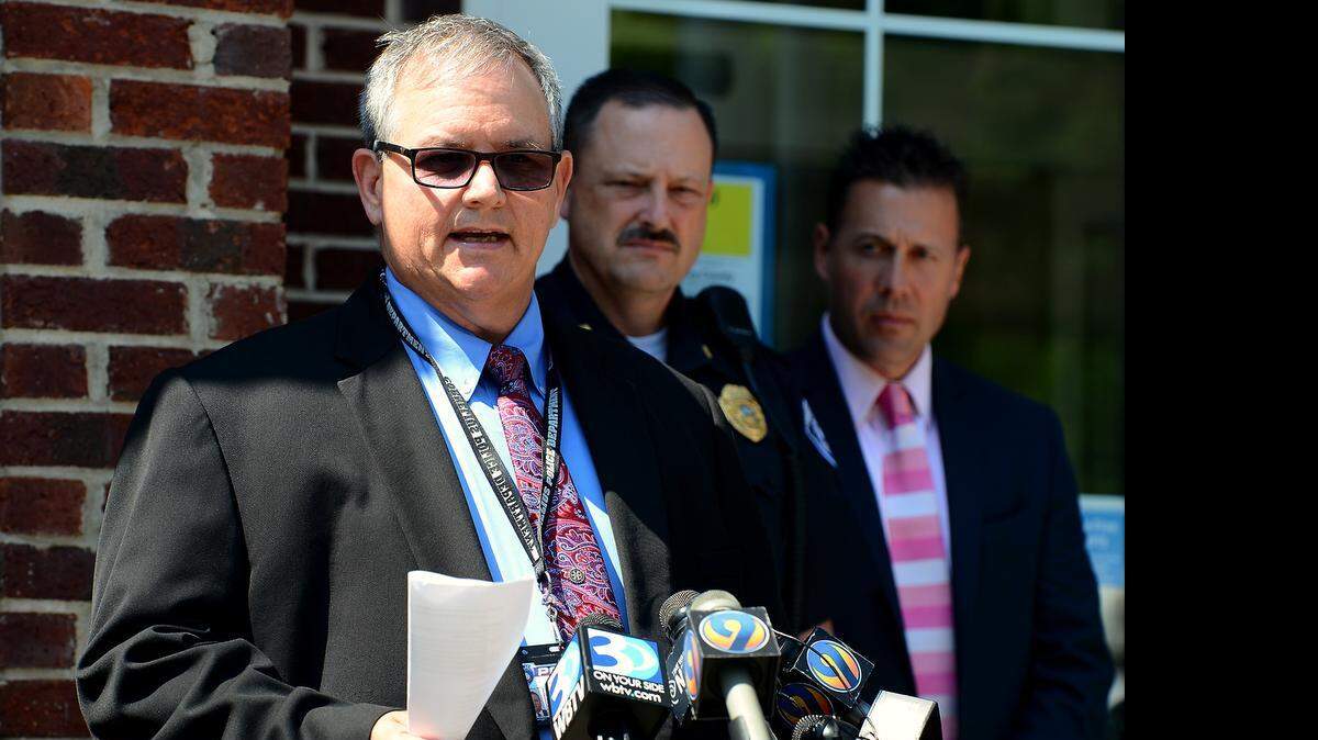 
Cornelius Police Chief Bence Hoyle answers a question concerning the shooting of Lt. James Quattlebaum on Saturday, May 2, 2015. Hoyle and Cornelius Mayor Chuck Travis addressed the media during a press conference outside the Cornelius Police Department. Quattlebaum was shot by 16-year-old Grayson Ferrell while responding to a domestic call on Saturday.
