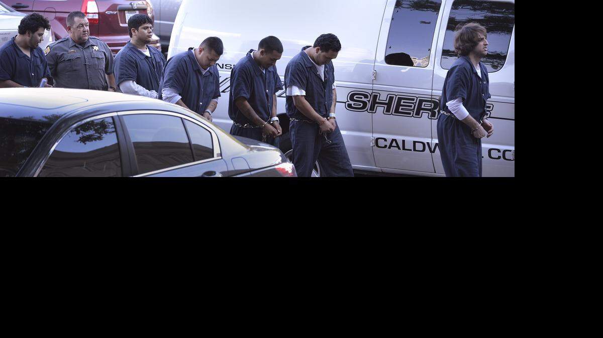 
Suspected members of the MS-13 gang arrive at the federal courthouse in Charlotte for a bond hearing on Tuesday morning.

