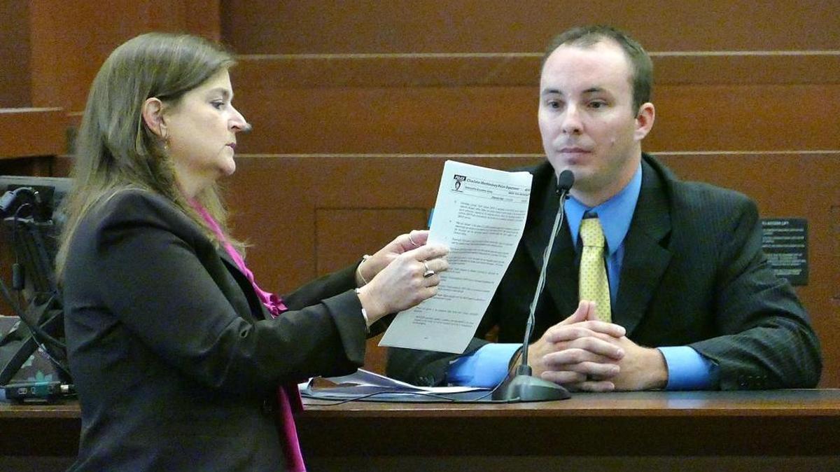 Teresa Postell, assistant district attorney, questions Randall Kerrick. Kerrick was charged with voluntary manslaughter of Jonathan Ferrell. A unanimous verdict was required, but the jury deadlocked 8-4 to acquit and a mistrial was declared. Ferrells’ family called for a retrial. But Cooper, whose office handled the prosecution, announced that he would not refile the charges because his prosecutors did not think they could get a conviction.