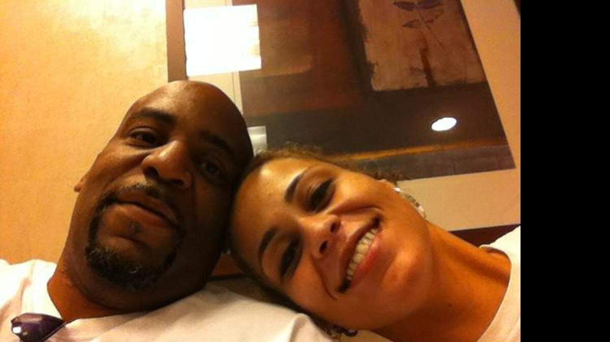 
FILE PHOTO: Glenn Gullette smiles with his daughter, Galana.
