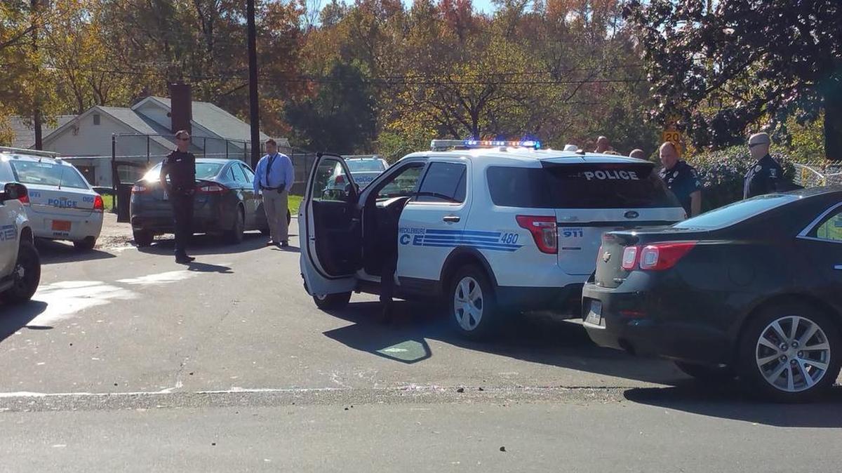 Police have two suspects in custody after a robbery at a Wells Fargo branch on Park Road Tuesday morning.