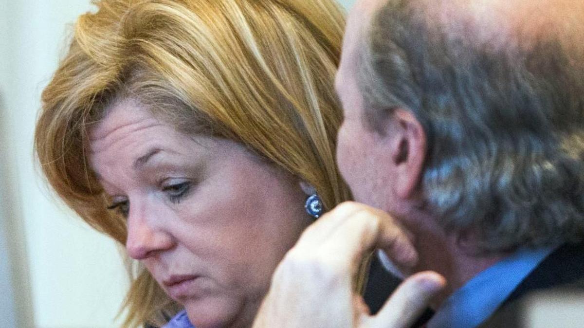 Christine Mumma and Jim Cooney confer during a recess after the NC Bar disciplinary panel found that Mumma violated a professional conduct rule Thursday, Jan. 14, 2016, at the North Carolina State Bar in Raleigh. The case against Mumma, head of the NC Center on Actual Innocence is being heard on allegations of professional misconduct while investigating the innocence claim of then-convicted Joseph Sledge in a double homicide from 1976.