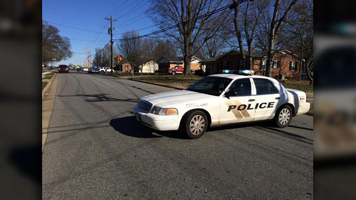 Two deputies were serving an eviction notice on Virigina Avenue in Statesville when they noticed a man inside the house with a knife.