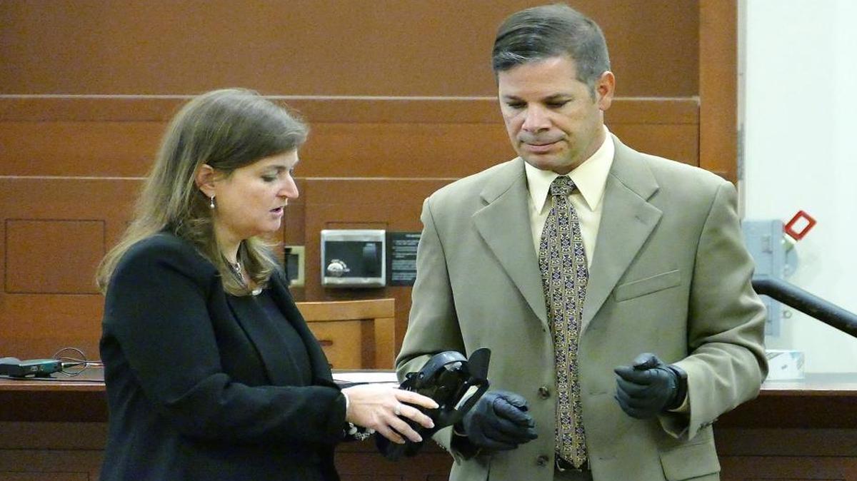
State Assistant Attorney General Teresa Postell and Charlotte-Mecklenburg police Capt. Mike Campagna displayed a Taser for jurors in the trial of Officer Randall “Wes” Kerrick. Kerrick fatally shot Jonathan Ferrell after another officer fired his Taser and missed.

