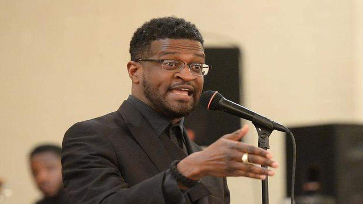 
Civil rights activist John Barnett speaks at a “cease-fire” rally on Sunday at Mount Zion Church of God in Charlotte.
