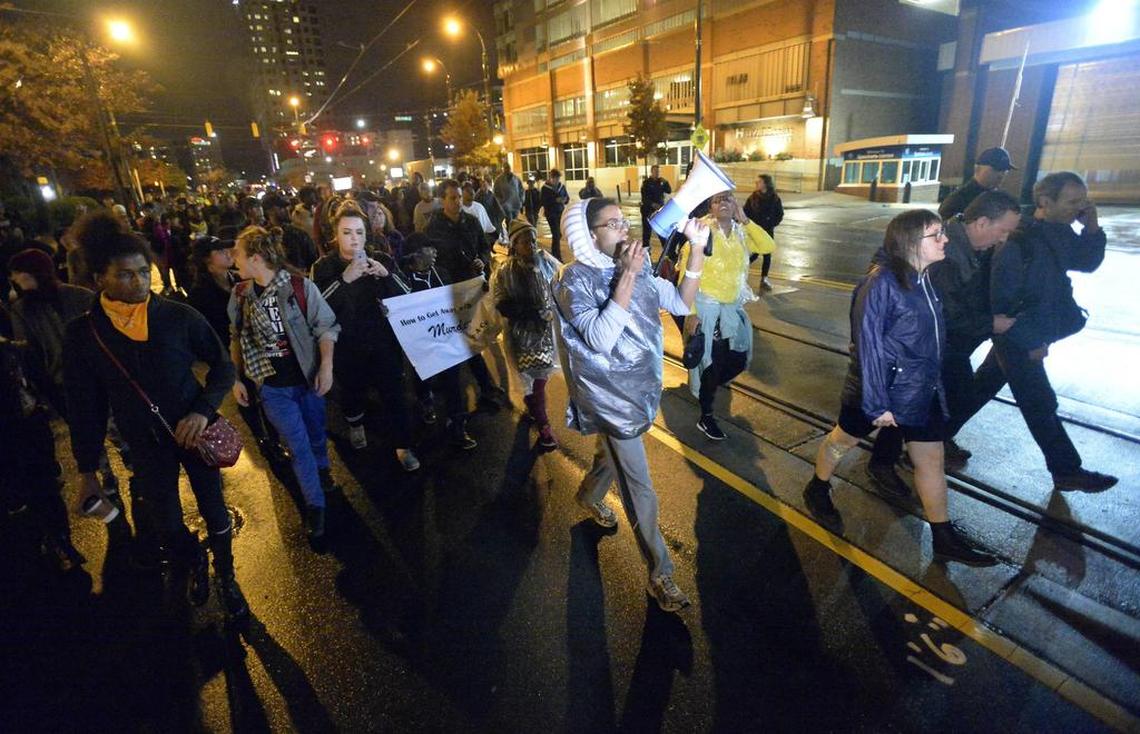 Protestors march along Caldwell Street in uptown Charlotte on Nov. 30, 2016 in the aftermath of no indictment being given in the death of Keith Lamont Scott. On Wednesday, Scott’s widow sued, saying her husband’s death resulted from excessive police force.