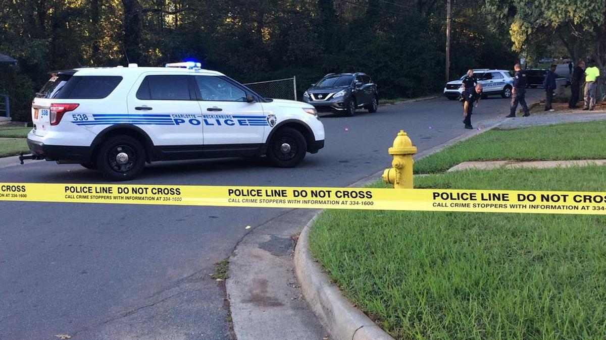 A man and a woman were shot during a gun battle off West Boulevard in Charlotte on Monday.