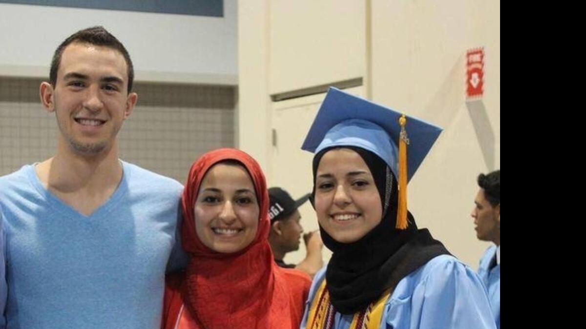 
Deah Barakat, 23, (left) his wife Yusor Abu-Salha, 21, (center) and Abu-Salha’s sister, Razan Abu-Salha, 19, of Raleigh.
