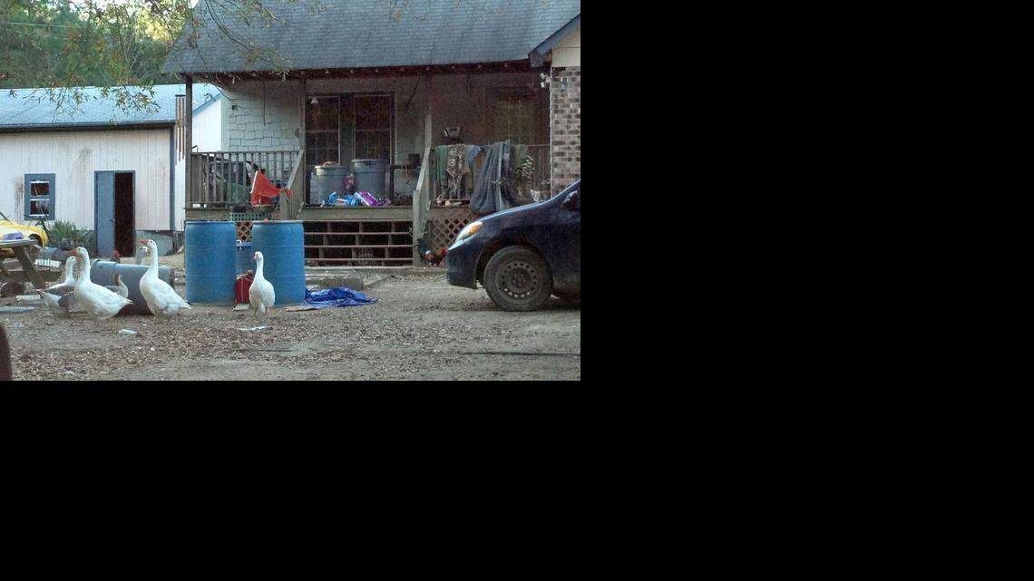 In 2013, an 11-year-old boy was found handcuffed by the ankle to the porch of this Monroe-area home with a dead chicken tied around his neck. Last month, the state agreed to pay $1 million to the victim and two other children seized from the home.