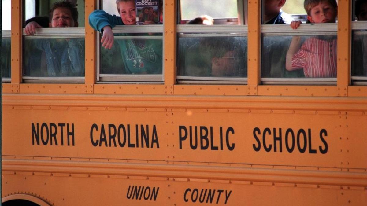A Union County Public Schools bus driver was arrested Sunday for allegedly posting threats on social media, police say.