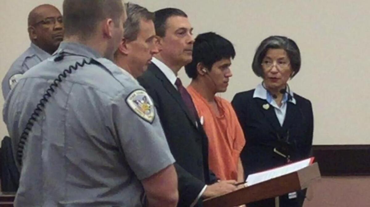 Kevin DeJesus, second from right, with 16th Circuit Chief Public Defender Harry Dest, center, and an interpreter, right, as DeJesus pleaded guilty to the killing of Jesse Campbell Thursday in court.