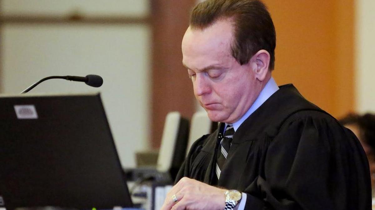 Wayne County Judge Arnold O. Jones works from the bench during a trial in Goldsboro, NC last year. Jones was convicted Friday on charges that he tried to bribe a federal agent with two cases of Bud Light to get text messages from the judge’s phone.