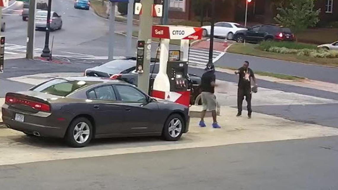 This is a still from video surveillance released by Charlotte-Mecklenburg Police of two men suspected of being involved in a shootout in Plaza Midwood.