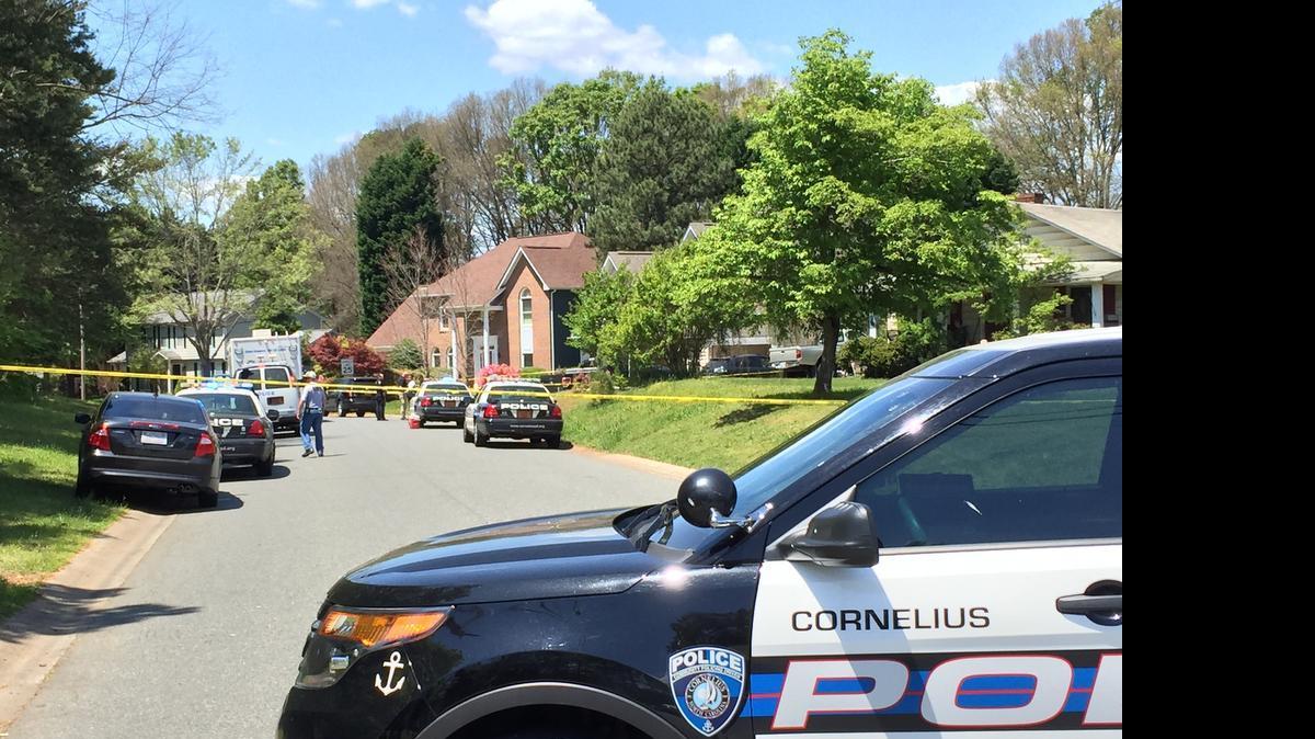 
Police converge on the scene where a Cornelius police officer was shot Saturday.
