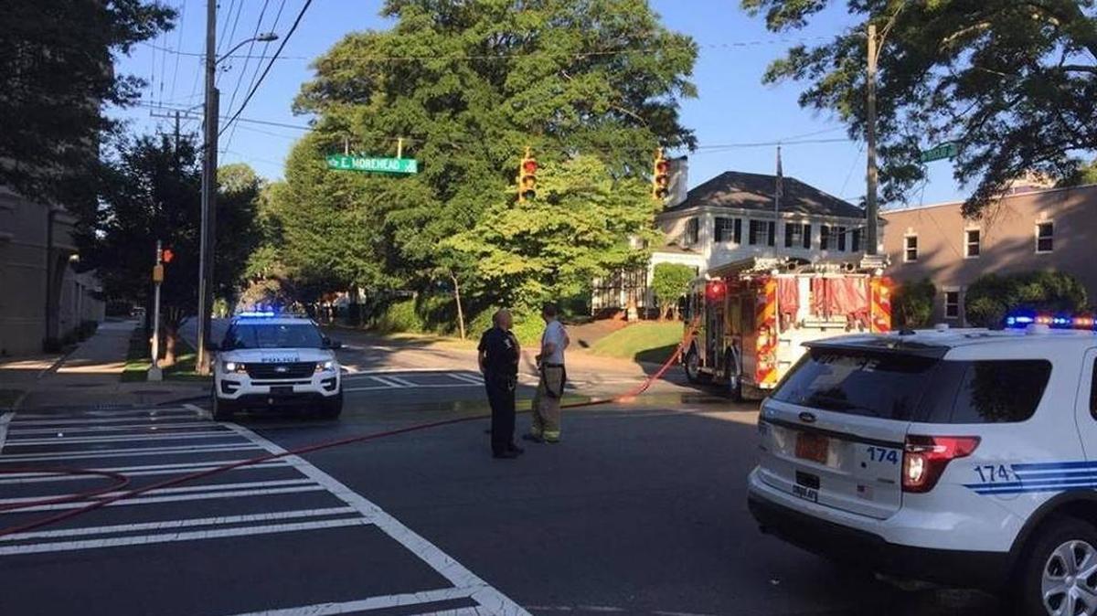 Authorities remained at the scene Saturday morning where a CMPD officer fatally struck a pedestrian.