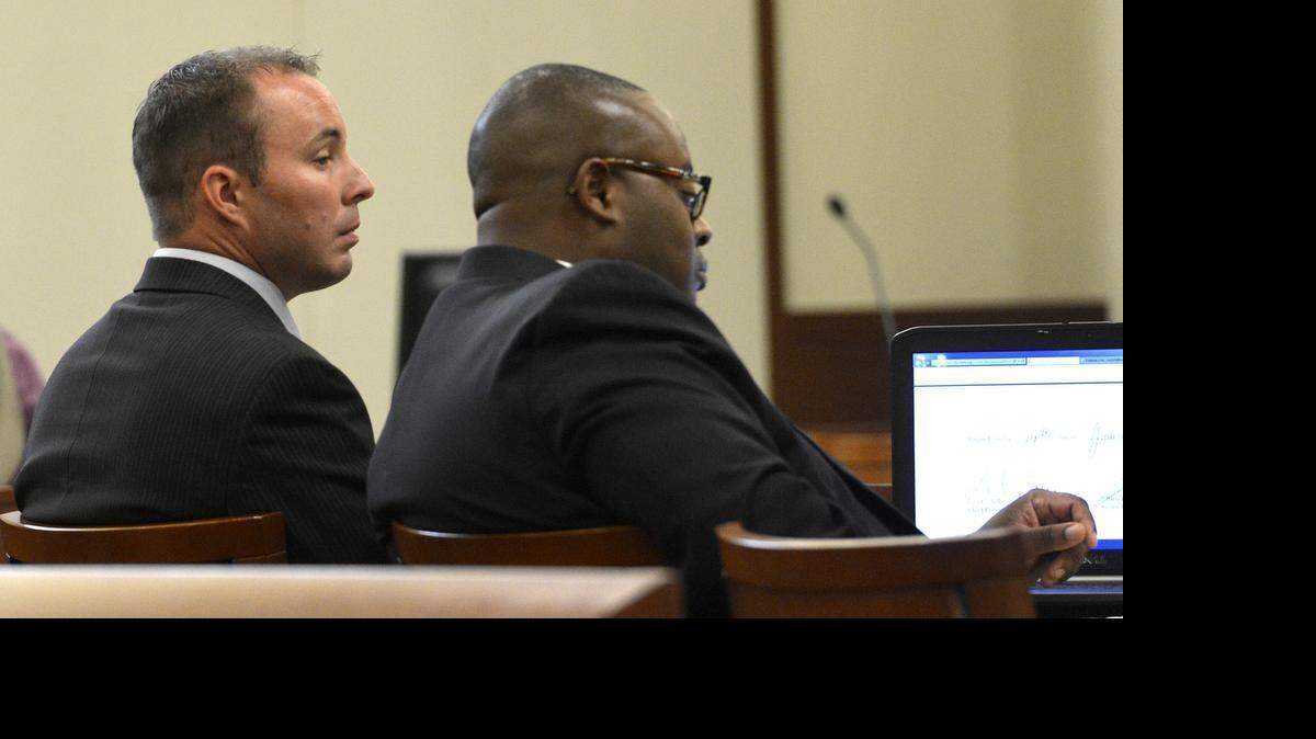 
Wes Kerrick, left, with attorney Michael Greene during the first day of his trial for killing Jonathan Ferrell, July 20, 2015. Kerrick is charged with voluntary manslaughter in the shooting death of 24-year-old Jonathan Ferrell on September 14, 2013, along Reedy Creek Road. Ferrell was unarmed and shot ten times.
