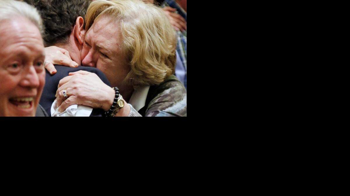 
Chris Kirk, left, his son-in-law, Nation Hahn, and Hahn’s late wife’s mom, Debra Funderburk, react Wednesday afternoon as the jury returns its verdict against Jonathan Broyhill. Broyhill was found guilty of the first-degree murder of Jamie Hahn and the attempted murder of Nation Hahn.
