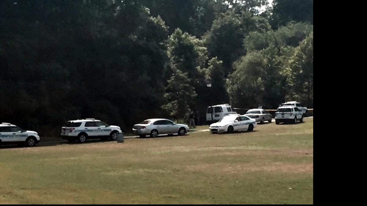 
Police respond to Alexander Street Park, where a man’s body was discovered on Sunday.

