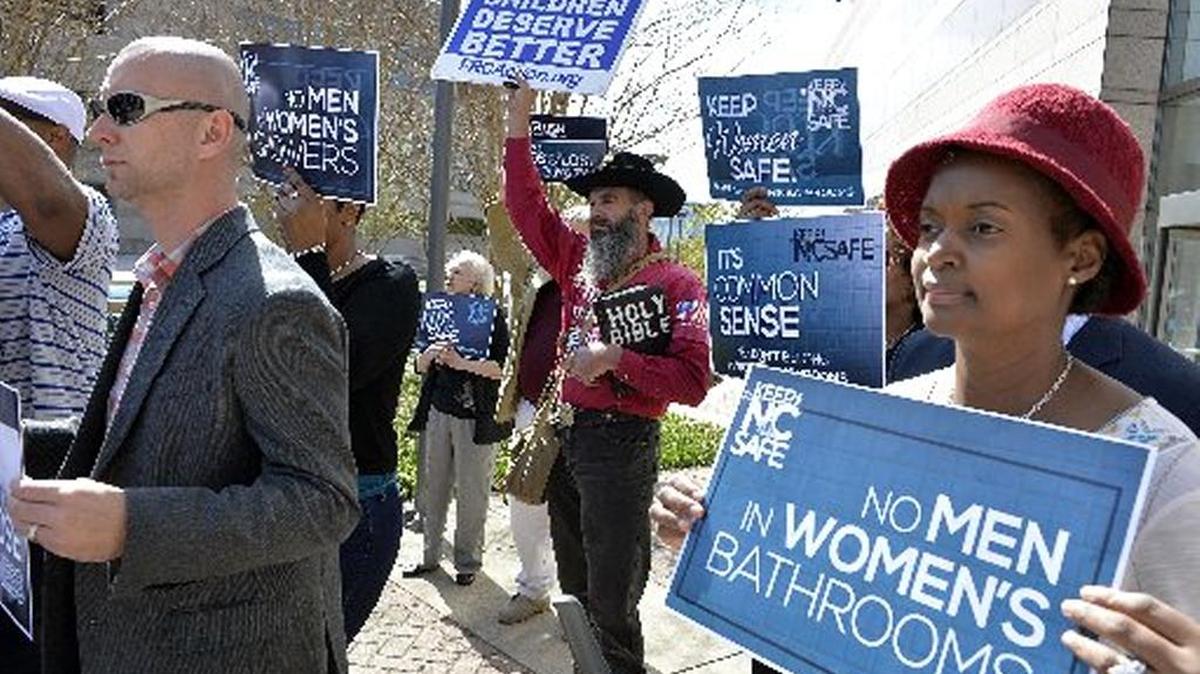 Marchers protesting the Charlotte City Council’s passage of LGBT protections, including bathroom rights for transgender individuals, demonstrate outside the Government Center in Charlotte last March. With the city council rescinding its ordinance, the General Assembly reportedly will consider a repeal of its controversial HB2 as early s Tuesday