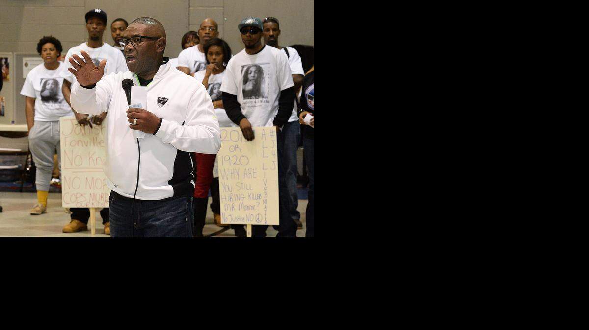 
CMPD Chief Rodney Monroe spoke to a concerned crowd at a community meeting with police. About a dozen protesters wore “Justice for Janisha” t-shirts and held signs. A CMPD officer shot Janisha Fonville in February.
