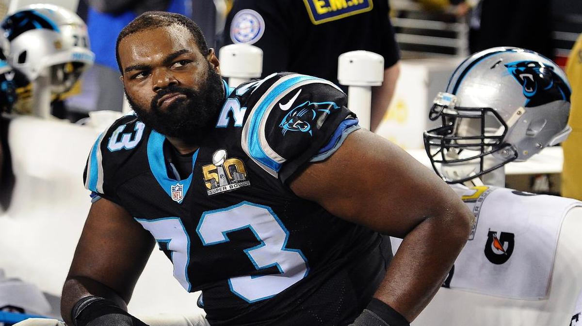 Carolina Panthers left tackle Michael Oher sits on the team’s bench frustrated during fourth quarter action against the Denver Broncos during Super Bowl 50. The Broncos defeated the Panthers 24-10.