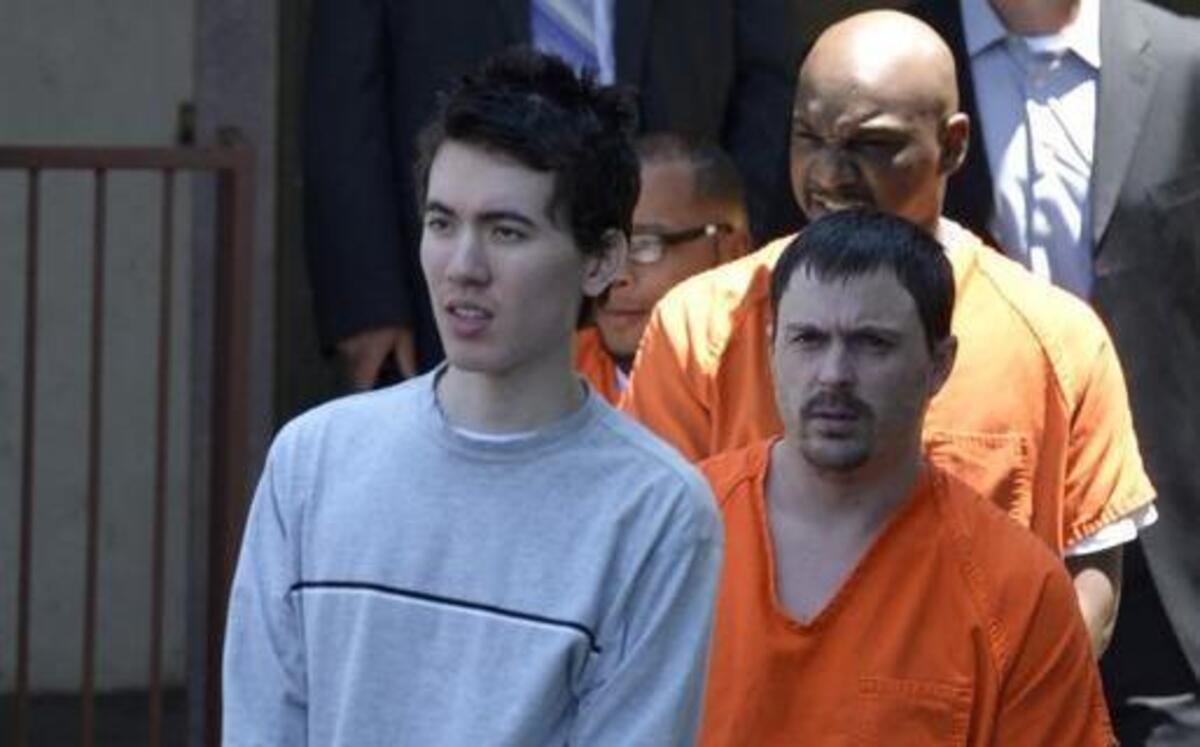 JUNE 2015 FILE PHOTO: Justin Nojan Sullivan, 19, exits the Federal courthouse in Charlotte shortly after his arrest.