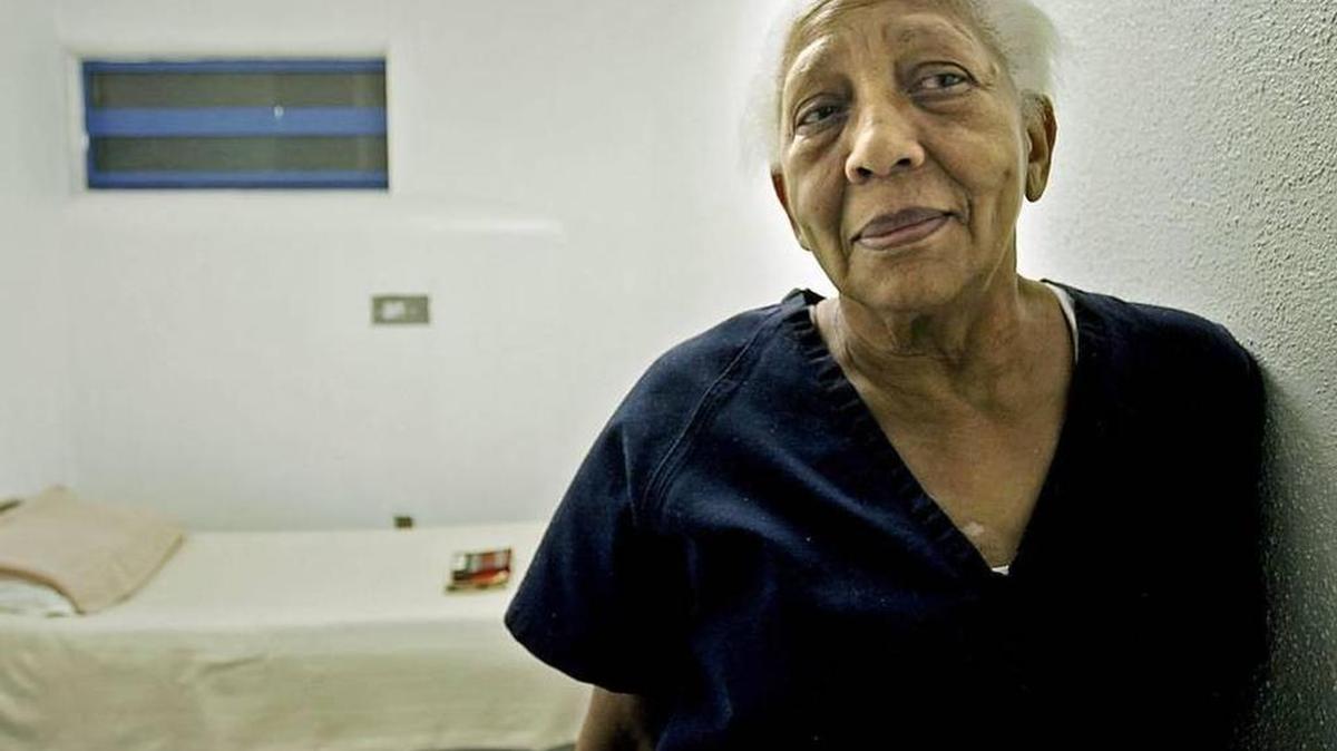 This 2005 file photo shows Doris Payne, a then-75-year-old international jewel thief, posing in her cell at Clark County jail in Las Vegas. Payne, suspected in a July theft in Charlotte was recently arrested in the Atlanta area while trying to steal earrings.