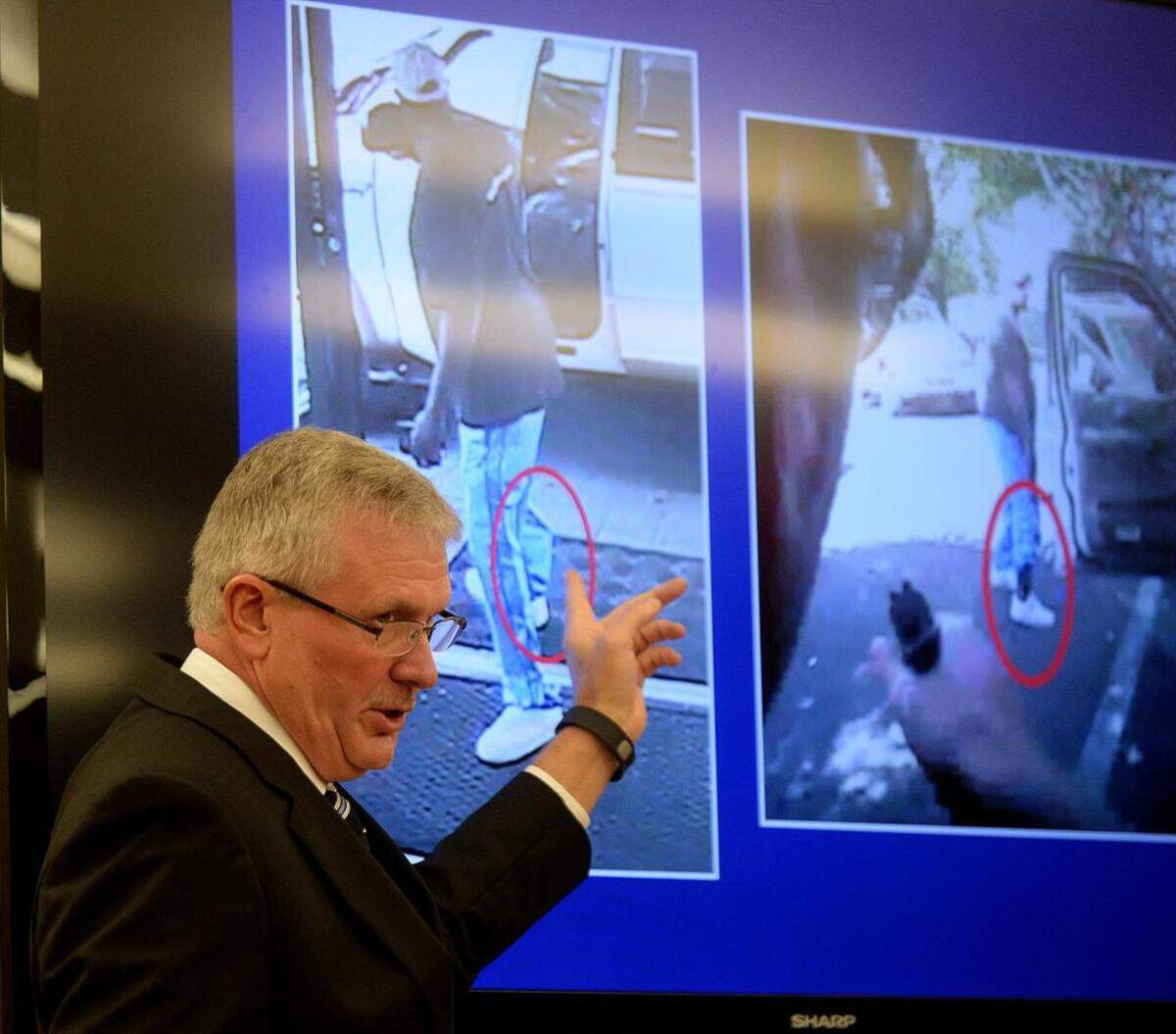 Then-District Attorney Andrew Murray points at what he says was Keith Scott’s ankle holster while announcing that a Charlotte-Mecklenburg police officer acted lawfully in the fatal shooting of Scott. On Wednesday, Scott’s widow filed suit, alleging that the shooting amounted to excessive force.