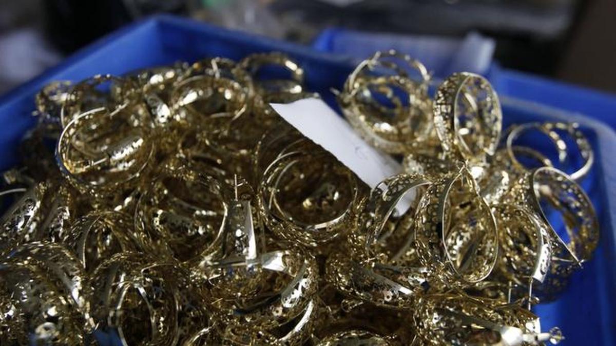 Unfinished jewelry is shown in a Chinese factory in this file photo. Charlotte jeweler Benjamin Abraham was indicted Thursday on fraud charges in connection with an alleged $3.5 million investment fraud scheme involving jewelry, precious metals and gemstones.