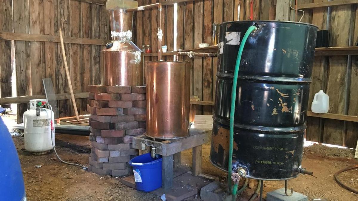 Authorities in Burke County busted this moonshine still and cited the owner for manufacturing and possessing non-tax paid liquor.