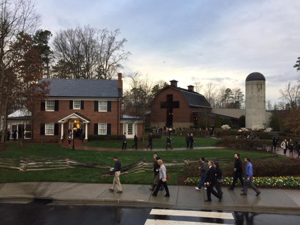 Billy Graham Evangelistic Association and Samaritan’s Purse employees pay their respects to Rev. Billy Graham on Monday at the Billy Graham Library in Charlotte. Graham died on Wednesday at the age of 99. Rev. Graham will lie in repose on Monday and Tuesday at the site.