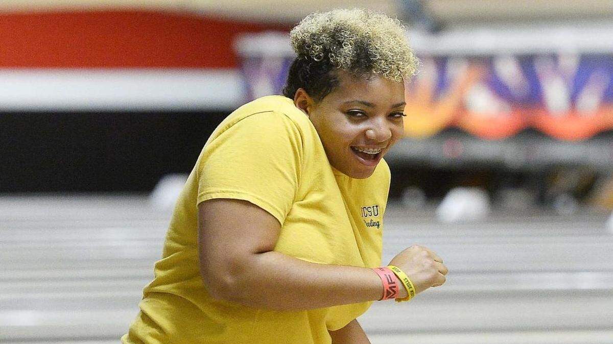 Johnson C. Smith University sophomore Alexus Duncan bowls at a fundraiser for Empower the Youth on Sunday.