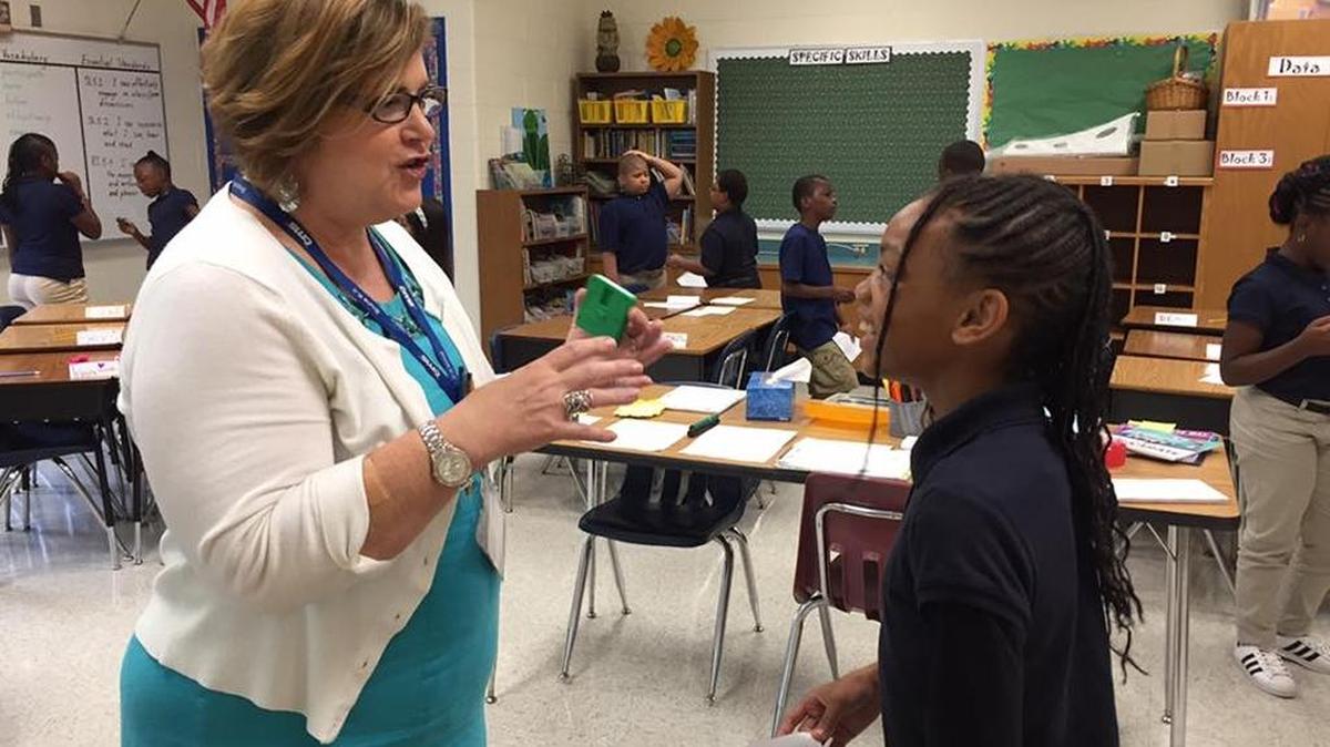 Bruns Academy fifth-grade teacher Marie Calabro is already teaching students at one of the four CMS schools that opened in July.