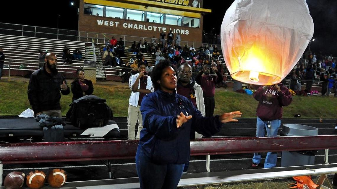 Board members agree the West Charlotte High stadium, shown here at a 2014 memorial program, needs renovation, but it’s not on the 2017 bond list.