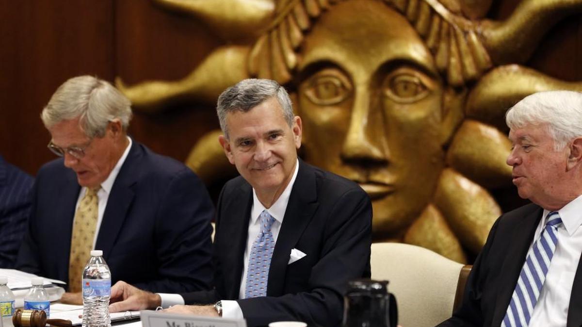 John C. Fennebresque, chairman, smiles before the UNC Board of Governors meet at the Spangler Center in Chapel Hill on Friday, Oct. 23, 2015, to elect the next president of the university system.