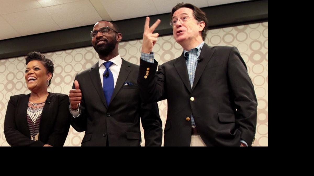 
Stephen Colbert surprised Greenville, SC, Alexander Elementary School teacher Damon Qualls Thursday announcing he’s helping to Flash Fund every project in South Carolina posted on DonorsChoose.org. (Pictured left to right: Yvette Nicole Brown, Damon Qualls, Stephen Colbert).
