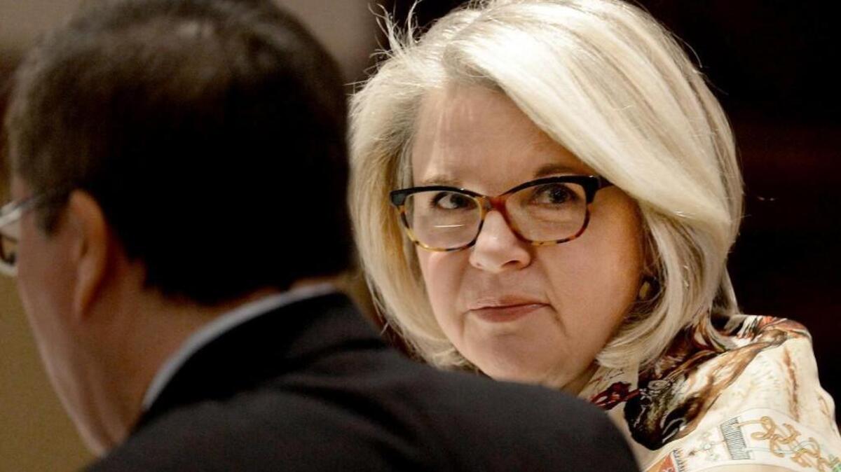 Margaret Spellings, UNC president-elect, looks around the room where the Board of Governors are meeting at the Grandover Resort in Greensboro, N.C. Friday, February 12, 2016.