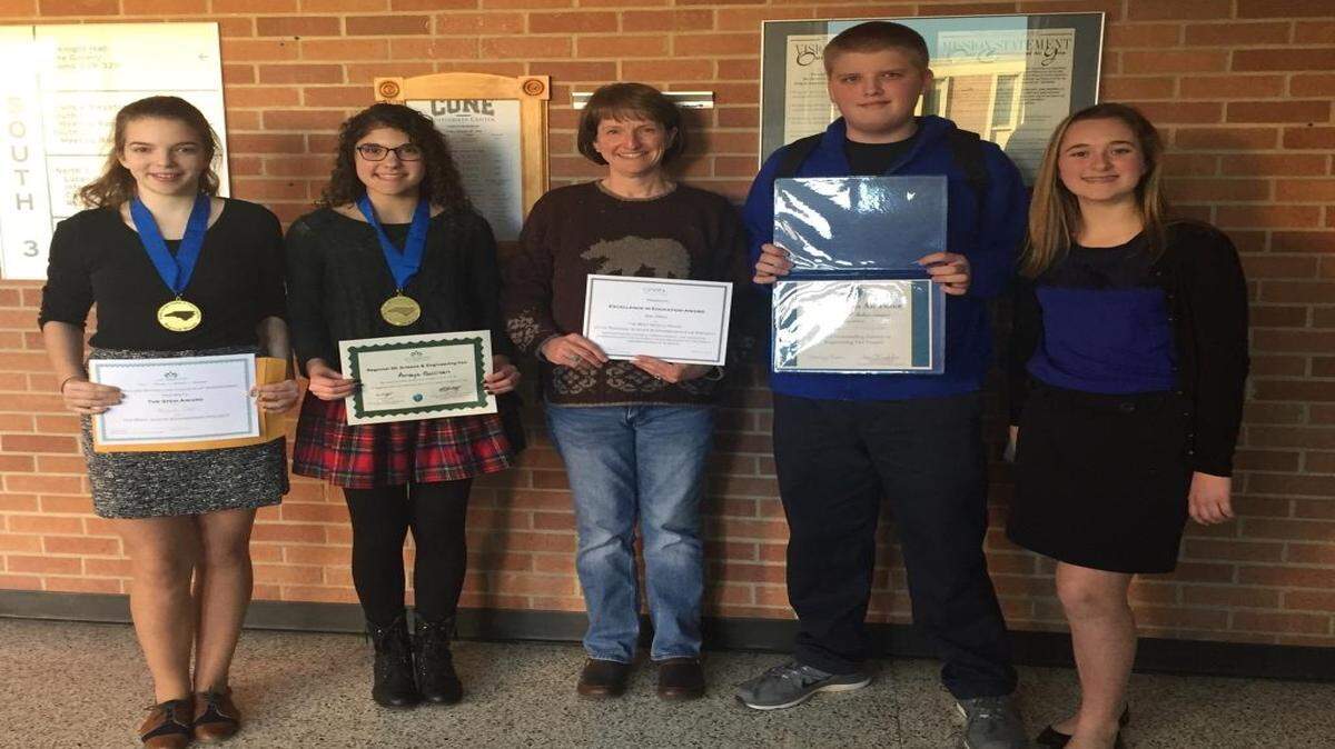 Students from SouthLake Christian Academy received honors at the 2016 UNC Charlotte Region 6 N.C. Science and Engineering Fair. From left, Lexie Cash, Amaya Gallivan, Kim Wilson, Sam Cronquist and Alexis Stoddard.